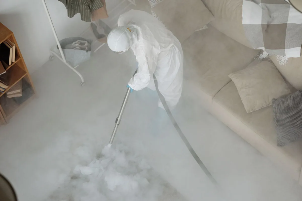 Biohazard cleanup technician in protective equipment, Winston, OR